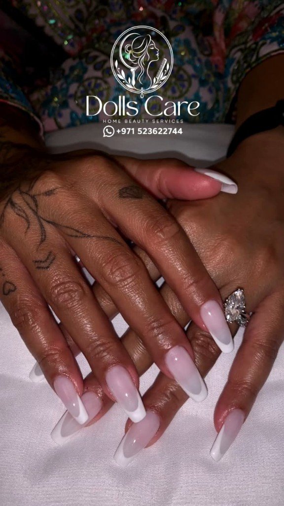 Long coffin French tip nail extensions at home Dubai