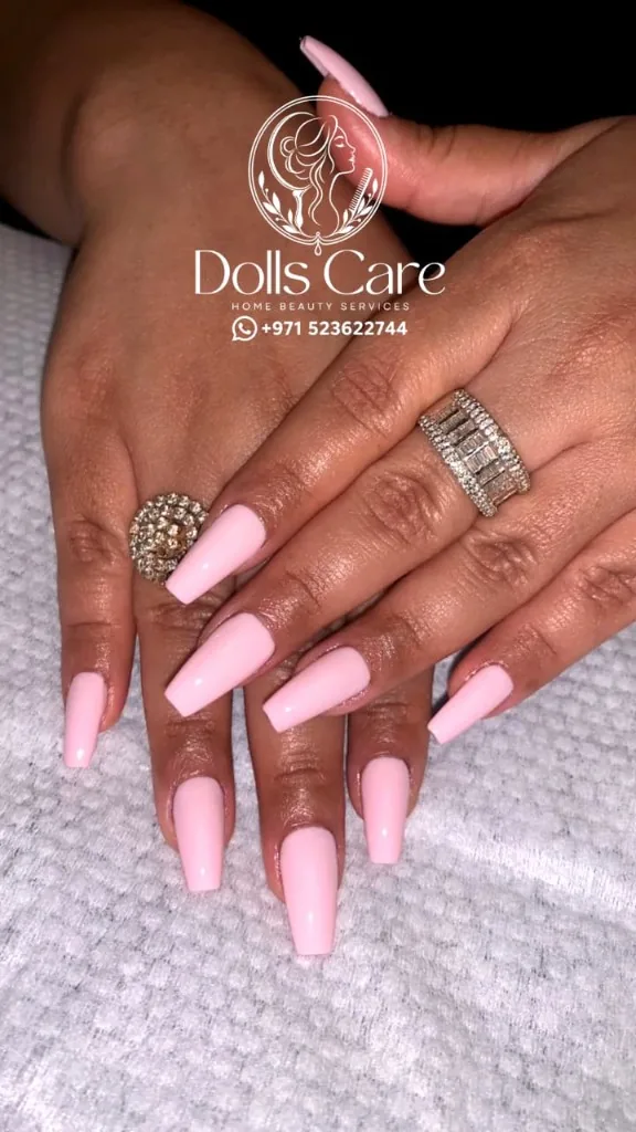 Glossy burgundy gel manicure at home Dubai