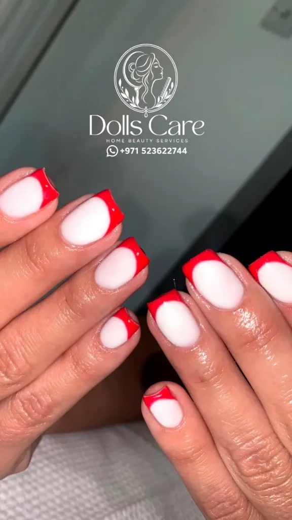 Red and white tip nail art at home Dubai